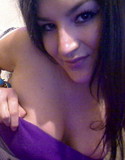 Gnd model gina teases in a purple dress