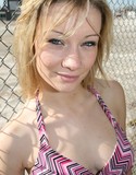 Kaylee rain flashing by fence