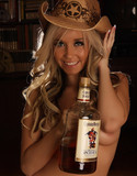 Alluring vixens sexy in a cowgirl hat