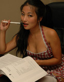 Cute asian does her homework naked